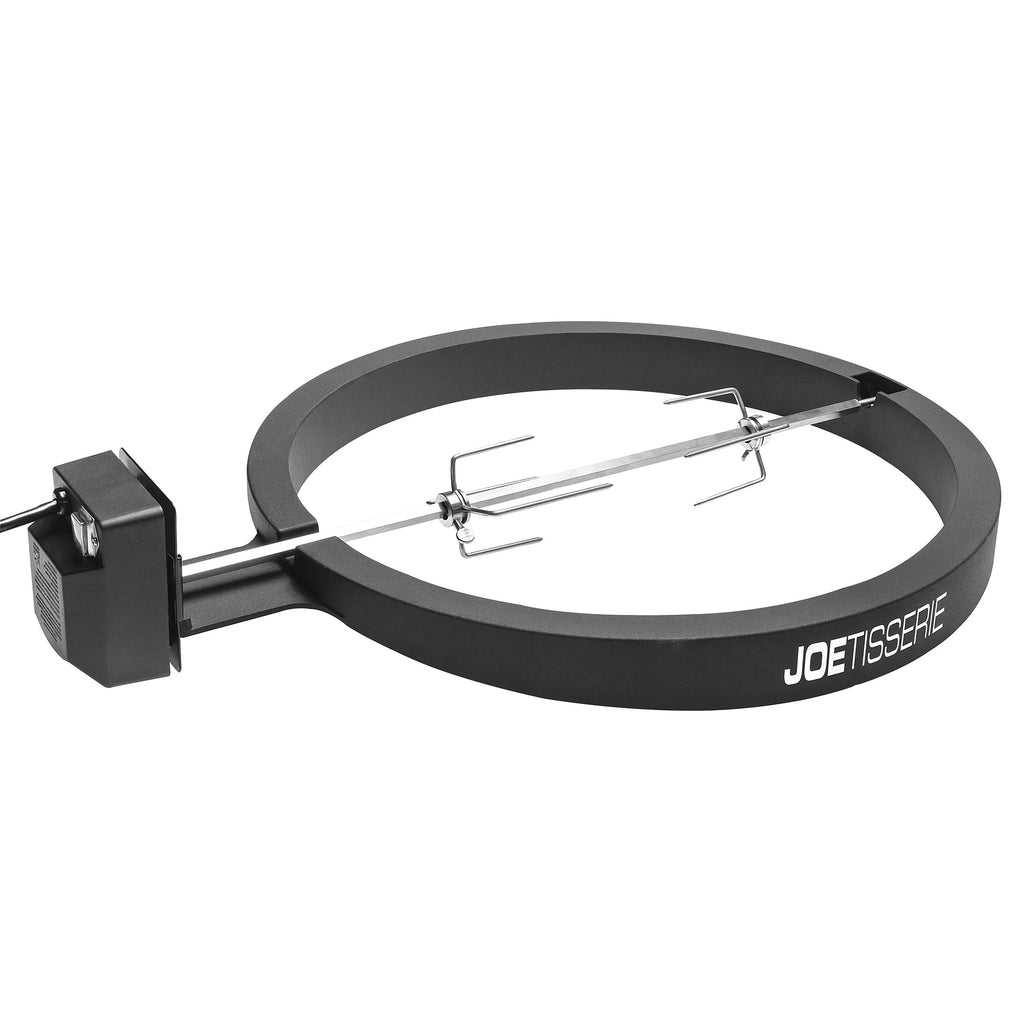 JoeTisserie spit with meat claws mounted in the JoeTisserie ring