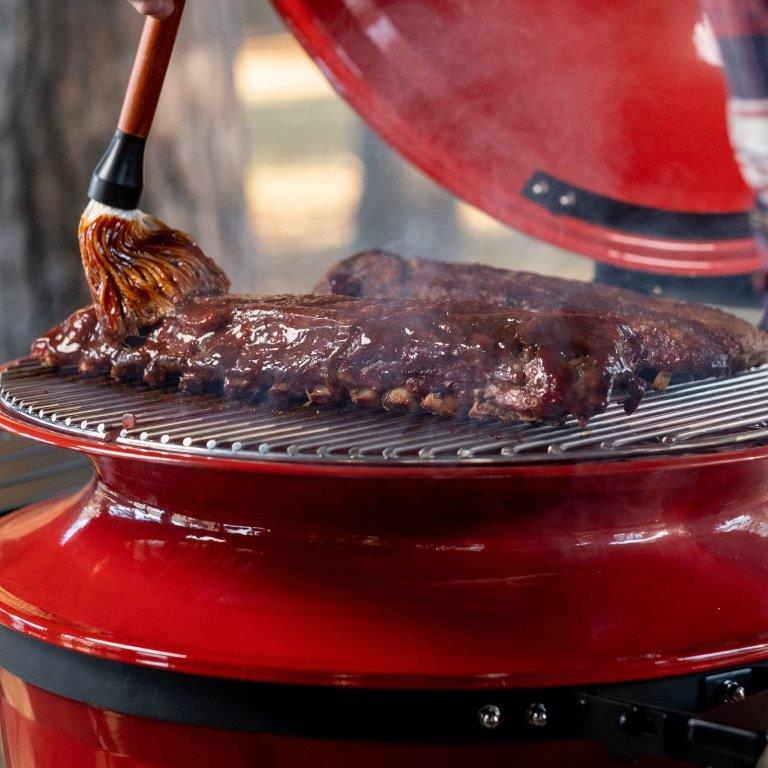 Smoking ribs on the SlōRoller™