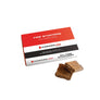 A box of 24 Kamado Joe Fire Starters. 2 separated fire starters sit in front of the box.