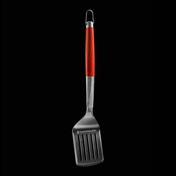 The stainless steel Kamado Joe spatula against a black background.
